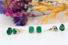 Adorn yourself with these stunning 3.33ct Rich Green Emerald Stud Earrings! Crafted from 14K Gold, these lustrous green beauties will add a touch of classic sophistication to any look. Perfect for any occasion, these earrings will have everyone wondering where you got them! ♥ A stunning pair of rich green rectangle-shaped emerald earrings♥ The earrings measure 10mm in length, 6.8mm in width, and stand 4.5mm tall♥ Material: 14K yellow gold♥ Gemstones: Emeralds weigh 3.33ct total and originate fro Emerald Earrings Studs, Gold Satin, Emerald Earrings, Green Beauty, Stunning Jewellery, Ear Studs, Rectangle Shape, Emerald Green, Round Diamonds