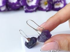 A delicate and sophisticated sterling silver earrings showcasing a raw purple Amethyst gemstone from Africa. Purple Crystals of Amethyst signify magic, mystery, royalty, and good judgment Power, protection, healing. Purple Amethyst will help you calm your nerves and ease your mind when you're going through uncertain times. They will stop you from overthinking or from thinking negative thoughts. ❀ As an option you can buy a set of earrings + necklace. The necklace is made of Sterling silver and d Purple Crystal Earrings For Gift, Handmade Amethyst Crystal Earrings As Gift, Handmade Amethyst Crystal Earrings For Gift, Silver Amethyst Crystal Earrings As Gift, Silver Amethyst Crystal Earrings For Gift, Amethyst Natural Stone Earrings As Gift, Amethyst Natural Stone Earrings For Gift, Amethyst Earrings With Natural Stones For Gift, Silver Crystal Earrings With Natural Stones For Gift