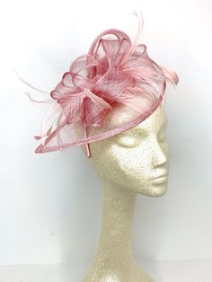 "Sinamay Fascinator with feathers and satin headband. \"The Kenni\" from The Hat Hive. ♥Attaches with matching, satin headband. ♥Ultra Light & comfortable to wear. ♥Packed and shipped in a sturdy box with special love & care to ensure a safe delivery. ♥Includes a hat care card with instructions on how to care for & keep your piece beautiful. ♥Over 14,000 pieces sold & 2,000 5 star reviews. Our \"Hive Girls\" come back year after year for their next hat or fascinator. Loving their Womens Tea Party, Blush Pink Fascinator, British Hats, Large Brim Hat, Sinamay Fascinator, Womens Tea, Pink Fascinator, Types Of Hats, Satin Headband