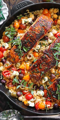 Mediterranean Salmon & Rice with Chickpeas, Cherry Tomatoes, Olives, Lemon, Oregano, and Feta Cheese - in a cast iron skillet. Fish Dinner Recipes, Mediterranean Diet Meal Plan, Salmon Dinner, Salmon Dishes