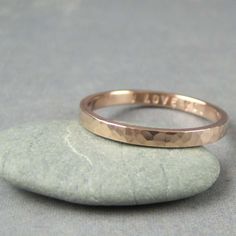 14k rose gold ring 2mm wide hammered gold band by TwoSilverMoons Anniversary Rose Gold Hammered Stackable Rings, Hammered Rose Gold Stackable Rings As Gift, Hammered Rose Gold Stackable Rings For Wedding, Wedding Stackable Hammered Rose Gold Rings, Wedding Hammered Rose Gold Stackable Rings, 14k Rose Gold Ring, Hammered Gold, Personalized Rings, Gold Bands