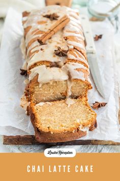 a loaf of cinnamon bread sitting on top of a cutting board