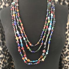 ON SALE Very nice huge statement for Strand long glass beaded statement necklace in very good vintage condition. Measures 30 inches long. Perfect for any outfit, collection and sure to become a favorite. Multicolor Glass Costume Jewelry Necklaces, Multicolor Glass Costume Jewelry Necklace, Vintage Multi-strand Colorful Beaded Necklaces, Vintage Multi-strand Beaded Necklaces With Colorful Beads, Vintage Multi-strand Beaded Necklace With Colorful Beads, Vintage Multicolor Multi-strand Beads, Unique Long Beaded Necklace With Faceted Beads, Multi-strand Glass Beaded Colorful Necklace, Multi-strand Glass Bead Colorful Necklace