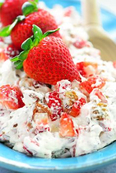 strawberries and cream salad in a blue bowl