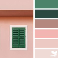 green shutters on the side of a pink building with white trim and window panes