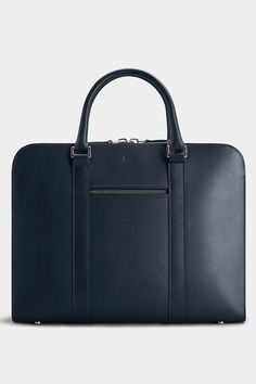 Make a statement with our Palissy Briefcase – a modern case acting as your personal portfolio. Modern Rectangular Laptop Bag For Travel, Modern Travel Laptop Bag Rectangular Case, Modern Travel Briefcase Rectangular Case, Modern Travel Briefcase With Top Carry Handle, Timeless Rectangular Travel Briefcase, Elegant Briefcase With Laptop Sleeve For Work, Timeless Briefcase With Luggage Sleeve For Business Trips, Elegant Office Briefcase With Luggage Sleeve, Modern Formal Laptop Sleeve Case