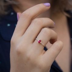 Luxurious yet dainty ruby and diamond ring, art deco inspired ring.Handmade and beautifully and finished by an inspired jewelry artist.Lots of sparkle and natural beauty with this excellent cut, eye clean marquise ruby.A ring to cherish for a lifetime, a valuable gift that impresses all!All ring sizes available, if you cannot find your ring size in the selection menu you are welcome to contact us for a quote.Ring Features......................• Made to order, beautifully finished• Arrives gift r Elegant Red Solitaire Sapphire Ring, Elegant Red Sapphire Solitaire Ring, Dainty Rose Gold Oval Ruby Ring, Dainty Diamond Accent Rings For Proposal, Elegant Ruby Ring With Rose Cut Diamonds For Wedding, Elegant White Gold Ruby Ring With Rose Cut Diamonds, Dainty Oval Ruby Ring In Rose Gold, Timeless Ruby Ring With Rose Cut Diamonds For Wedding, Elegant Ruby Birthstone Promise Ring