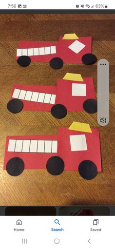 the paper cars are cut out to look like firetrucks