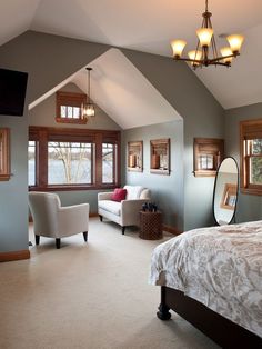 a bedroom with gray paint colors and wood trim on the ceiling is featured in an instagram