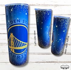 the golden state warriors travel tumbler cup is shown in three different colors and sizes