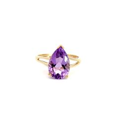 A solitaire ring.  Prong set in the center of the ring is a pear shaped faceted amethyst. The ring has a split style shank. This ring is a size 11.  This ring includes a free sizing up or down 2 sizes.  Once a ring is re-sized, we guarantee the work but we are unable to offer a full refund on the ring. Please contact us for additional sizing options and updated shipping dates if you would like the ring to be sized.   Stone Information Type: Amethyst Measurements: 15.2x10.0mm Metal Content Guaran Classic Teardrop Gemstone Rings, Teardrop Amethyst Ring For Anniversary, Fine Jewelry Teardrop Purple Ring, Pear-shaped Purple Amethyst Ring With Prong Setting, Formal Teardrop Amethyst Ring, Fine Jewelry Purple Teardrop Ring, Purple Pear-shaped Amethyst Ring With Prong Setting, Purple Teardrop Amethyst Ring For Anniversary, Purple Pear-shaped Ring With Prong Setting