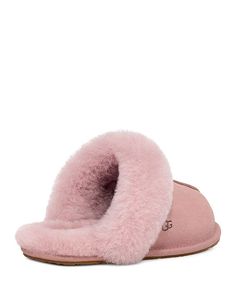 Keep cozy this season with the Women's Scuffette Shearling Mule Slipper from UGG. Crafted from plush Australian sheepskin with a cozy lining and easy slip-on style, these stylish slippers will have you stepping in comfort. Featuring a round toe profile, genuine shearling trim and logo detail, they offer the utmost in wearable luxury both indoors and out. Order your true size for the ideal relaxed fit to enjoy the superior softness and warmth of UGG's signature shearling throughout cool nights by Classic Shearling Slippers For Winter, Classic Sheepskin Slippers With Round Toe, Winter Sheepskin Slippers With Faux Fur Lining, Classic Sheepskin Slippers For Winter, Winter Sheepskin Slippers With Suede Lining, Ugg Shoes Women, Womens Uggs, Womens Slippers, Shoe Collection