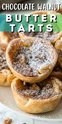 chocolate walnut butter tarts stacked on top of each other with the words, chocolate walnut butter tarts