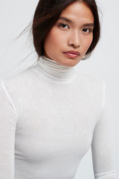 Meet our favorite multi-tasking silhouette, the Eloise Sheer Turtleneck. She features several signature Marcella details—including thumbhole sleeves and extra length around the torso. Crafted from our European sheer jersey for an ultra-light feel and body-loving fit, Eloise is casual yet easy to dress up—a true staple. Eloise is also available separately in our non-sheer Tencel jersey. | Bianca, in hot pink, is 5'8.5" (174 cm) tall, wearing size XS. Emmy, in espresso, is 5'10.5" (179 cm), wearin Sheer Turtleneck, Fitted Long Sleeve, Acrylic Fiber, Sweatshirt Fabric, Turtleneck Top, Body Love, The A Team, Turtle Neck Top, Light Beige