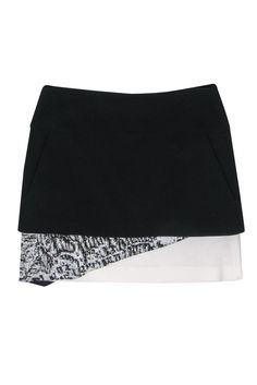 Current Boutique-Helmut Lang - Black & White Layered Miniskirt Sz 2 Fitted Layered Hem Skort, Fitted Layered Hem Mini Skort, Cotton Mini Skort For Night Out, Fitted Mini Skort With Layered Hem, Fitted Black Skirt With Layered Hem, Tiered Mini Skirt For Workwear, Elegant Cotton Lined Skort, Elegant Cotton Skort With Lined Skirt, Chic Black Skirt With Layered Hem