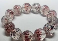 Material: super seven quartz beads  size :Approx 14mm (Due to different measurement methods and measuring instruments, there may be a deviation of about 0.5mm. If you mind, please do not buy it. Thank you for your understanding.)   quantity: 1 strands 6mm approx 29 pcs one strands 7mm approx25 pcs one strands 8mm approx 22 pcs one strands 9mm approx 21pcs one strands 10mm approx 19 pcs one strands 11mm approx 18pcs one strands 12mm approx 16 pcs one strands 13mm approx 16 pcs one strands 14mm ap Handmade Clear Beaded Round Bracelets, Healing Crystal Bracelet With Spacer Beads, Handmade Spiritual Crystal Bracelet With Round Beads, Gift Crystal Bracelet With Spacer Beads, Handmade Crystal Bracelet With Round Beads, Handmade Clear Beaded Bracelets With Round Beads, Handmade Clear Beaded Bracelets, Handmade Clear Round Beaded Bracelets, Handmade Clear Beaded Bracelets As Gift