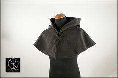 Made to order 100% woolen hooded cape comes in your choice of wool colors . It's a full circle with a lovely clousure with eyelets and lace (available also with clasps or button clousure). Cotton or satin lining available. Custome made. Unisex. Differt colours avalaible. 2 - 4 weeks for the shipping, it depends on the colors availability. The standard shipment for this item is posta priority, UPS expedited shipment available on request. Remember to read our policies before buying Gothic Hooded Winter Cape, Fitted Winter Cape For Cosplay, Gothic Cape For Larp In Fall, Medieval Winter Outerwear For Fantasy Events, Medieval Outerwear For Fantasy Events In Winter, Hooded Winter Cape For Fantasy Events, Hooded Cape For Fantasy Events In Winter, Gothic Hooded Cape For Larp, Fitted Cape For Winter Costumes