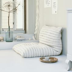 a bathroom with a white sink and mirror