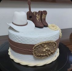 there is a cake that has boots and hats on it