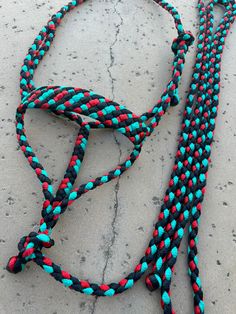 there is a multi colored rope on the ground