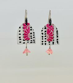 These super light weight earrings featured hand painted recycled aluminum in bold black and white with an accent of pink.   They are truly one of a kind!  As always, my ear-wires are 22 gauge sterling silver, hypoallergenic Artistic Black Nickel-free Earrings, Artsy Black Earrings With Ear Wire, White Artsy Earrings With Ear Wire, Artsy White Earrings With Ear Wire, Artistic Hand Painted Pink Earrings, Unique Pink Sterling Silver Earrings, Unique Nickel Free Pink Earrings, Unique Nickel-free Pink Earrings, Artistic Pink Nickel-free Earrings