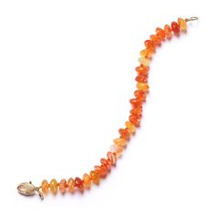 Fiery orange carnelians finished with our cheeky lobster clasp. Length 7". Ships within 5 business days. Orange Agate Gemstone Bracelets, Orange Carnelian Gemstone Bead Bracelets, Orange Carnelian Bracelets With Natural Stones, Orange Bracelet With Lobster Clasp, Orange Carnelian Beaded Bracelet With Gemstone, Orange Carnelian Beaded Bracelets, Orange Carnelian Hand-strung Bracelets, Orange Hand-strung Carnelian Bracelets, Orange Bracelet Jewelry With Lobster Clasp