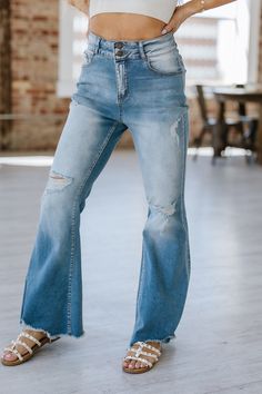 Experience the perfect combination of comfort and style with our Ayah Light Wash Flare Jeans. Made from high-quality denim, these jeans provide a flattering, slimming fit while the flare design adds a touch of trendy flair. Elevate your wardrobe and make a statement with these must-have jeans! Material:75% Cotton + 23% Polyester + 2% Elastane Model info; Models are 5'7", Size 2, wearing smalls Denim Flares With Five Pockets, Dark Wash Flare Denim Jeans, Dark Wash Denim Flare Jeans, High Rise Denim Flares For Fall, Trendy Medium Wash Flares With Five Pockets, Chic Flare Denim Jeans, High Rise Dark Wash Denim Flares, Denim Blue Flare Jeans With Five Pockets, Casual Dark Wash Flares With Frayed Hem