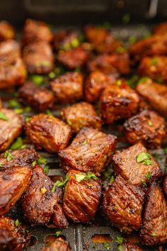 the meat is being cooked and ready to be served on the grill for people to enjoy