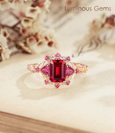 𝐌𝐚𝐢𝐧 𝐒𝐭𝐨𝐧𝐞 𝐒𝐩𝐞𝐜: 💎 Stone: Ruby (Lab) 💎 Carat: 1.0ct 💎 Dimension: 5mm*7mm 💎 Cut: Princess cut 𝐒𝐢𝐝𝐞 𝐒𝐭𝐨𝐧𝐞𝐬 𝐒𝐩𝐞𝐜: 💎 Stone: Ruby (Lab) 💎 Carat: 0.20ct 🎨 Materials Available: ＊ 925 Sterling Silver ＊ 925 Sterling Silver (Electroplated) ＊ 10K Gold ＊ 14K Gold ＊ 18K Gold ＊ Platinum 📝 Reach out to me directly to personalize your ring size or gemstone--customization services are available upon request 📦 Packaging: Each ring is meticulously set in an elegantly designed gi Princess Cut Ruby Rings In Red, Red Ruby Princess Cut Rings, Red Princess Cut Ruby Ring Fine Jewelry, Red Princess Cut Ruby Ring With Prong Setting, Square Cut Ruby Ring For Wedding, Square Cut Ruby Wedding Ring, Red Square Cut Jewelry For Wedding, Red Ruby Princess Cut Ring For Gift, Gift Ruby Ring With Princess Cut