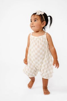 Bubble Romper Cream Cotton Onesie For Playtime, Beige Cotton Onesie For Spring, Cream Cotton Playtime Onesie, Cream Bubble Romper For Beach In Summer, Cream Bubble Romper For Beach And Summer, Spring Cotton Bubble Romper For Playtime, White Cotton Jumpsuits For Playtime, White Cotton Jumpsuits And Rompers For Playtime, Casual Beige Cotton Bodysuit