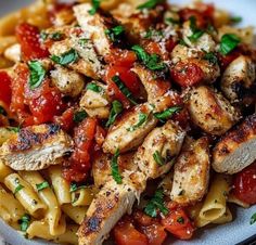 pasta with chicken, tomato sauce and parmesan cheese