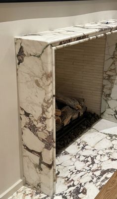 a room with marble walls and flooring in it