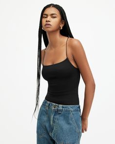 We're here for flattering silhouettes, and if you are too - get the Tilly Bodysuit on your radar immediately. Made from recycled fabrics, the texture is shirred for a comfortable, but flexible fit and feel. Complete with modern square neck shaping and 90s-inspired spaghetti straps with a bit of stretch. It's the perfect piece to keep on rotation for nights out and to layer under oversized linen shirts by day.   Square neck Four popper gusset closure Sleeveless Elasticated spaghetti straps Shirre Oversized Linen Shirt, Denim Cargo Pants, Square Neck Bodysuit, Linen Shirts, Leather Western Boots, Modern Square, 90s Inspired, Wide Leg Denim, Keep On