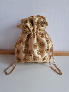 Vintage signed styled by Artel Montreal made in Honk Kong gold lurex fabric and gold glass seeds beadwork evening purse bag with gold color satin interior and chain- wedding bridal. Signed in interior. 8 x 6.5 x 1 inches. A beautiful ''something old'' for a bride! Condition: exterior; good condition ; interior: very clean - good condition - SOLD AS IS in its depicted vintage condition.  This purse was very littel used   IMPORTANT TO READ: To make this a smooth and pleasant transaction experience Potli Bags, Evening Purse, Something Old, Gold Glass, Montreal, Vintage Signs, Wedding Bridal, Purses And Handbags, Gold Color