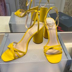 This Beautiful Fun Filled Yellow Sandal Is Offered New. It Is A Fun Summer Must Have And Is Your Wear With Everything Shoe! Yellow Sandals With 4-inch Heel For Summer, Yellow Sandals With Heel Strap For Evening, Yellow Evening Sandals With Heel Strap, Yellow Sandals With Heel And Ankle Strap, Formal Yellow Sandals With Wrapped Heel, Yellow Sandals With 4-inch Heel For Spring, Yellow Sandals With Wrapped Heel And Ankle Strap, Yellow Ankle Strap Sandals With Wrapped Heel, Yellow Evening Sandals With 4-inch Heel