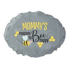 a stone with the words,'mommy's reason to bee happy'on it