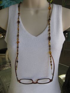 Brown Eyeglass Chain Brown Necklace Eyeglass by RalstonOriginals, $15.00 Handmade Brown Glass Jewelry, Handmade Brown Glass Beaded Necklaces, Wire Wrapped Round Glass Beaded Necklaces, Brown Glass Beaded Necklaces For Gifts, Brown Glass Beaded Necklaces As Gift, Brown Glass Beaded Necklaces With Colorful Beads, Brown Glass Beaded Necklace With Colorful Beads, Unique Glass Beaded Necklaces, Handmade Adjustable Glass Beaded Necklaces