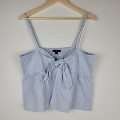 J. Crew Blue Sleeveless Baby Doll Tank Smocked Back Size Xl Front Bow Tie And Loop Close Open Belly Smocked Back Nwt Breathable Baby Doll Cami 66% Cotton 34% Polyester Length 23" Pit To Pit 19" Blue Summer Tank Top With Tie Straps, Summer Blue Tank Top With Tie Straps, Blue Tank Top With Tie Straps For Summer, Blue Cotton Tank Top With Ruffles, Cute Blue Sleeveless Tank Top, Blue Summer Tops With Tie Straps, Blue Sleeveless Tops With Tie Straps, Blue Cotton Tops With Tie Straps, Blue Tie Straps Tops For Summer