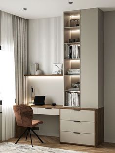 a desk with a laptop on top of it next to a book shelf and bookshelf