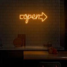 a neon sign that says open on the wall