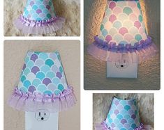 three different views of a paper lamp shade with fish scales and purple ruffles