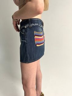 Vintage denim mini skirt Dolce and Gabbana. Super cute rare D&G 2000's style skirt. Multicolor striped knitted 2 pockets Size 26/40 tag S (see the measurements)  Condition 9/10  Made in Tunisia  length - cm/"  waist  - cm/"  📍 follow the shop on Instagram: @𝚔𝚘𝚛𝚊𝚛𝚎_𝚟𝚒𝚗𝚝𝚊𝚐𝚎 All measurements taken with garment lying flat.  Vintage sizes vary greatly! We recommend comparing measurements with a similar style garment you own for best fit! If you have any other questions, please contact u Y2k Cotton Jean Shorts With Pockets, Cotton Mini Skirt In Y2k Style, Y2k Mini Cotton Skirt, Y2k Fitted Jean Shorts With Pockets, Y2k Style Multicolor Mini Skirt, Retro Mini Skort With Pockets, 90s Mini Skirt With Pockets, Casual Striped Mini Skort, Casual Striped Mini Length Skort