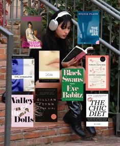 there is a woman sitting on the steps with books and headphones in her ears