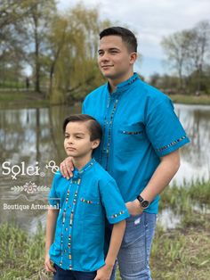 Beautiful Traditional Guayabera for Boys. This elegant button up Shirt is perfect for a special occasion such as First Communion, Baptism, Weddings, etc. Traditional Blue Shirt For Spring, Blue Traditional Shirt For Spring, Traditional Blue Shirt For Summer, Traditional Blue Summer Shirt, Traditional Blue Fitted Shirt, Traditional Fitted Blue Shirt, Traditional Collared Blouse For Summer, Traditional Collared Summer Blouse, Traditional Summer Blouse With Buttons