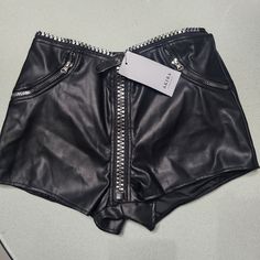 Nwt Akira Pleather Zipper Shorts High Waist Leather Bottoms For Club, Edgy High-waisted Faux Leather Shorts, Edgy Club Shorts For Spring, Trendy Bottoms With Side Zipper For Night Out, Chic Club Shorts For Spring, Edgy Party Bottoms With Side Zipper, Edgy Fitted Shorts With Zipper Closure, Edgy Fitted Leather Shorts, Edgy Leather Pants With Zipper Closure For Party