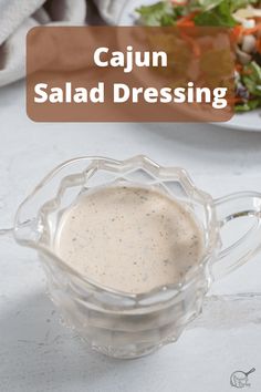 a salad dressing in a glass bowl on a table