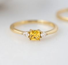 Yellow Topaz Center Stone Ring In 14k Gold, Yellow 14k Gold Diamond Ring, 14k Gold Yellow Diamond Ring, Yellow Sapphire Rings With Gemstone Accents As Gift, Yellow Diamond Ring In 14k Gold, Wedding Ring With Yellow Sapphire And Gemstone Accents, Gold Birthstone Ring With Gemstone Accents, Yellow Rings With Citrine And Gemstone Accents, 14k Gold Yellow Rings With Accent Stones