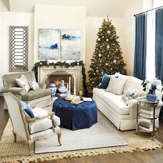 a living room filled with furniture and a christmas tree