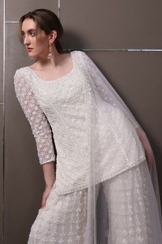 Off-white organza kurta with floral, thread and sequins hand embroidery. Comes with palazzo and a dupatta. - Aza Fashions White Palazzo Set With Dori Work For Wedding, Fitted White Palazzo Set With Cutdana Details, Fitted White Blouse For Eid, Designer Fitted Sharara With Handwork, White Semi-stitched Sets With Handwork, Fitted Sets With Handwork In Traditional Drape, White Handwork Choli For Wedding, Fitted Palazzo Set With Dori Work For Reception, Fitted Sets With Handwork And Traditional Drape