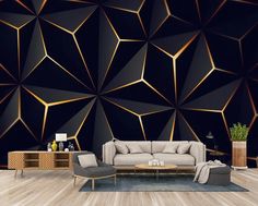 a modern living room with black and gold wallpaper